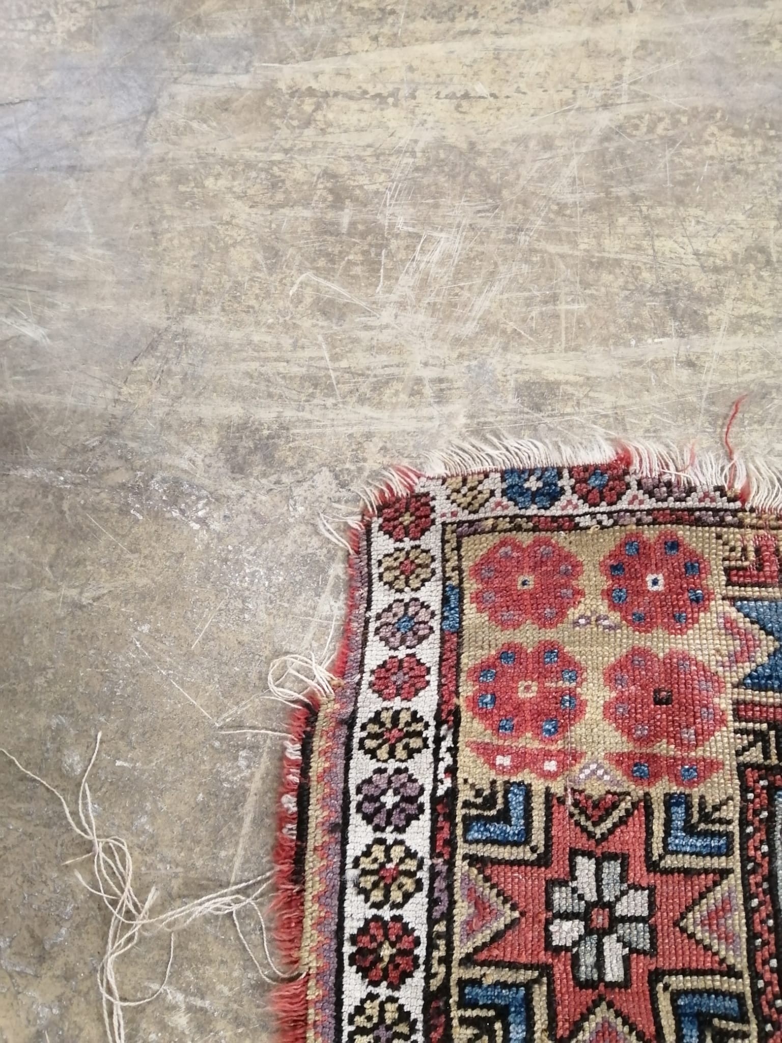 An antique Turkish Melas rug, 128 x 107cm